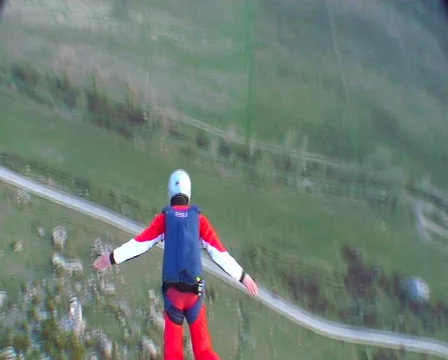 BASE jumping  skydiving from the mountain, subjective camera. Video stock 47720593