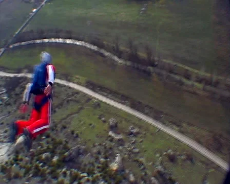 BASE jumping  skydiving from the mountain, subjective camera. Stock Footage 47720717