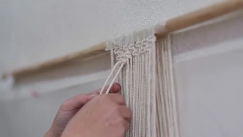 The base knots of macrame, the view from behind the shoulder close-up of the Stock Footage 159404160