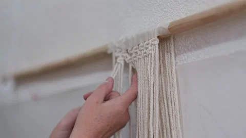 The base knots of macrame, the view from behind the shoulder close-up of the Stock Footage 159970512