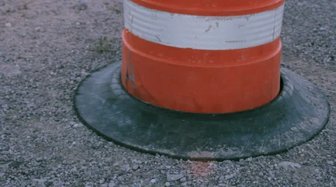Base of an Orange Traffic Drum Stock Footage 64364334