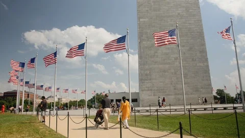 Base of the Washington Monument, American Flags, 4K Stock Footage 99472611
