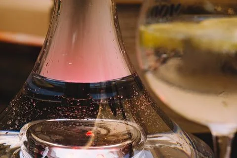Base with water from a hookah with colored lights. Stock Photos