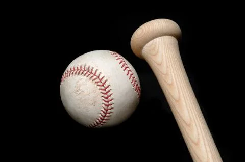 Baseball and bat on black Stock Photos