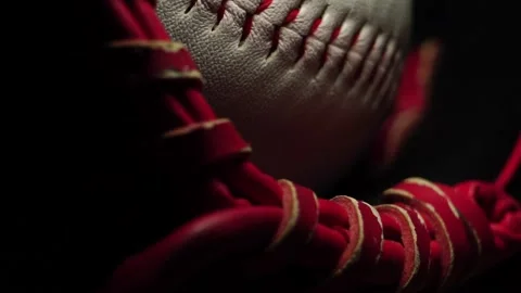 A baseball and equipment with a moving light follow Stockbeeldmateriaal 224319972