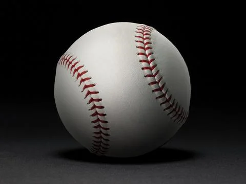 Baseball ball on black background Stock Photos