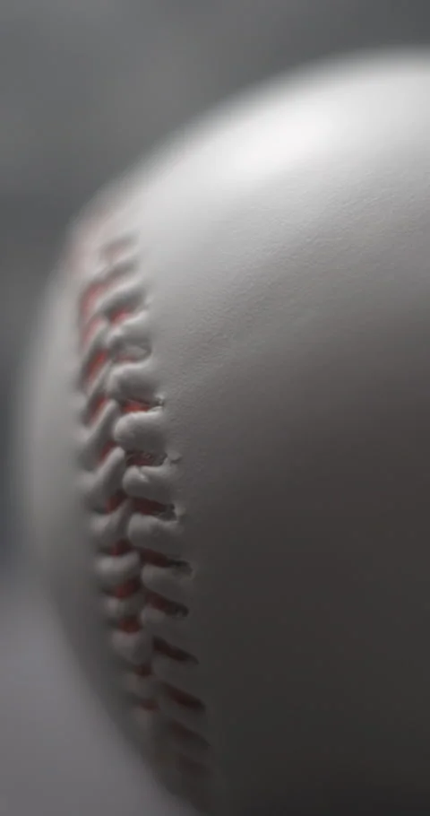 Baseball ball close-up rotating with smoke in studio slow motion, vertical view Stock-Footage 281039624