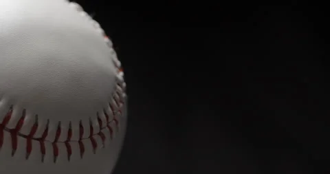Baseball ball close up rotating in studio Stock Footage 247513012