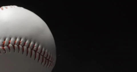 Baseball ball close up rotating in studio Stock Footage 247513042