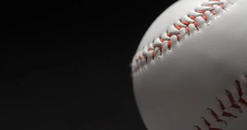 Baseball ball close up rotating in studio Stock Footage 247513196