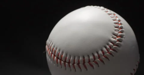 Baseball ball close up rotating in studio Stock Footage 247513265
