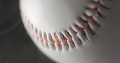 Baseball ball close up rotating in studio with smoke in slow motion, vertical Stock-Footage 247514116