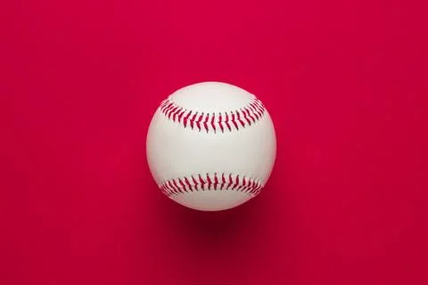 Baseball ball on red Stock Photos