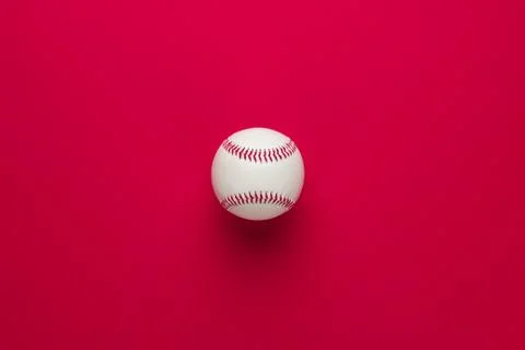 Baseball ball on red Stock Photos