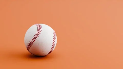 Baseball Ball Rolling from Left and from Right and Stopping on Brown 動画素材 335288267