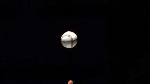 Baseball ball rotating in the air Stock Footage