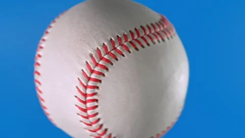 Baseball Ball Rotating in Super Slow Motion on Blue Screen for Video Transition Stock Footage 306122683