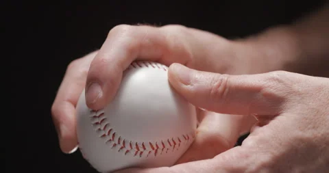 Baseball ball in studio close-up, macro, with smoke 4K, slow-motion Stock Footage 246430697