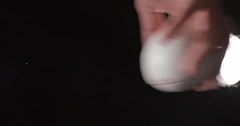 Baseball ball in studio close-up, macro, with smoke 4K, vertical slow-motion Stock Footage 246430921