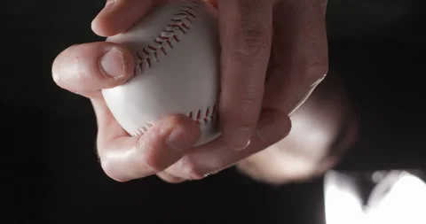 Baseball ball in studio close-up, macro, with smoke 4K, vertical slow-motion Stock Footage 246430963