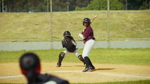 Baseball batter misses a pitch Stock Footage 335870093