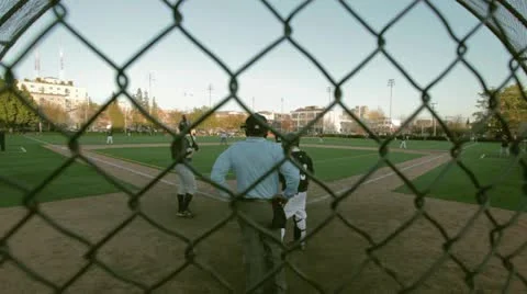 Baseball from behind the umpire handheld Stock Footage 10880791