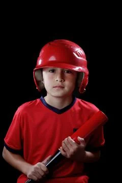 Baseball boy on black background Stock Photos