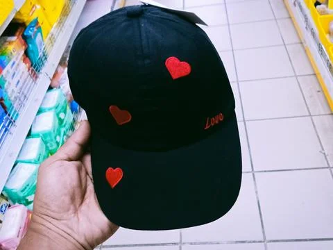 Baseball cap with red heart Stock Photos