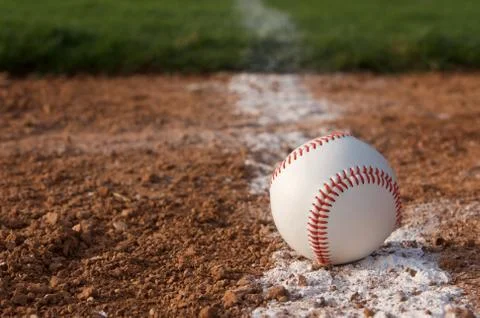 Baseball close up on the chalk line Foto stock