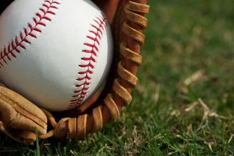 Baseball close up in a glove Stock Photos