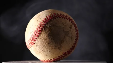 Baseball close up with smoke in the background isolated on black slow motion Stock Footage 206836946
