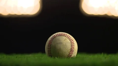 A baseball displayed under the lights. Stock Footage 72356589