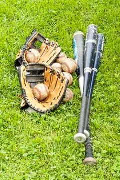 Baseball equipment on the grass Stock Photos
