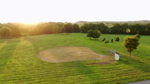 Baseball field diamond at school playground. grass field where student Stock Footage 136518729