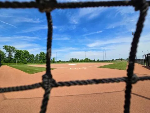 Baseball Field through the Net Stock Photos