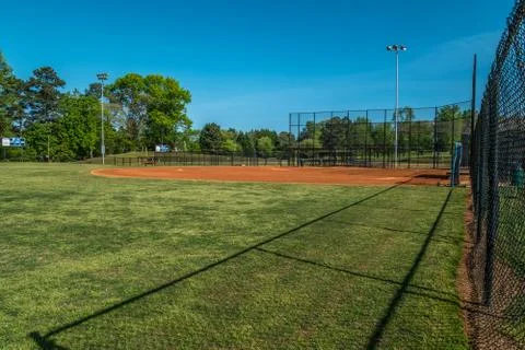 Baseball fields closed and locked up Coronavirus Stock Photos
