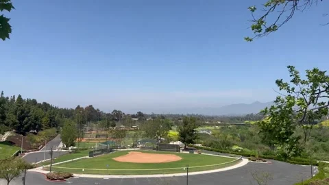 Baseball Fields Pan From Trees Stock Footage 239754514