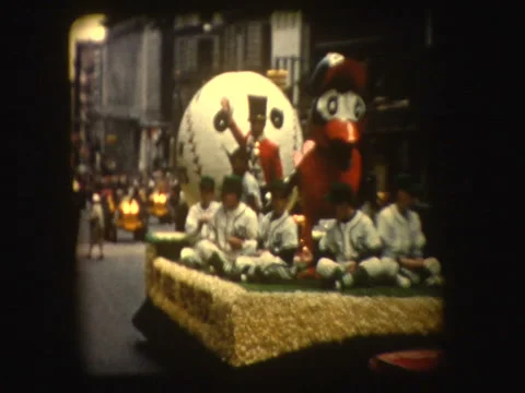 Baseball float with kids in 1961 Parade Stock Footage 1065522