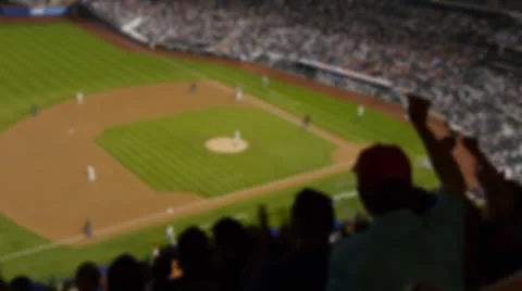 Baseball game fans audience cheering stadium crowd blur anonymous Stock Footage