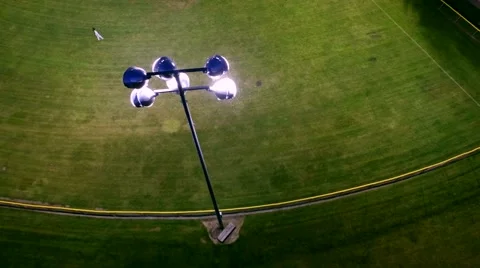 Baseball game on a field at a park in the evening Stock Footage 50303281