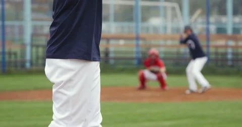 Baseball game, the pitcher throws the ball towards the batter, the batter Stock Footage 142491319