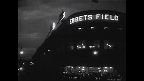 Baseball games begin to be played at night in the 1950s including the Brooklyn Stock Footage 101312436