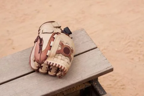 Baseball Glove on the bench Stock Photos