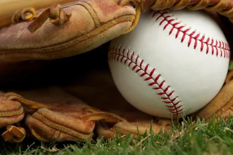 Baseball in a glove close up Stock Photos