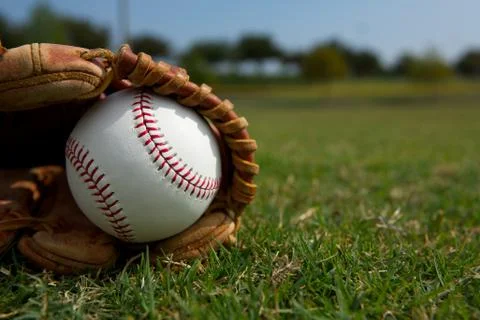 Baseball in a glove Stock Photos