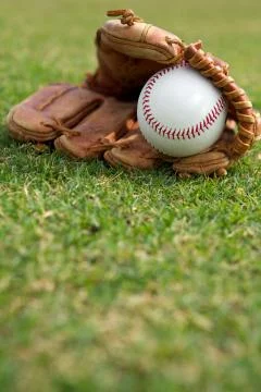 Baseball in a glove Stock Photos