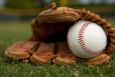 Baseball in a glove Stock Photos