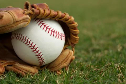 Baseball in a glove Stock Photos