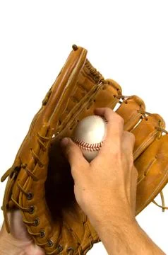 Baseball in glove Stock Photos