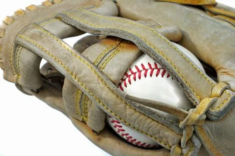 Baseball in glove Stock Photos